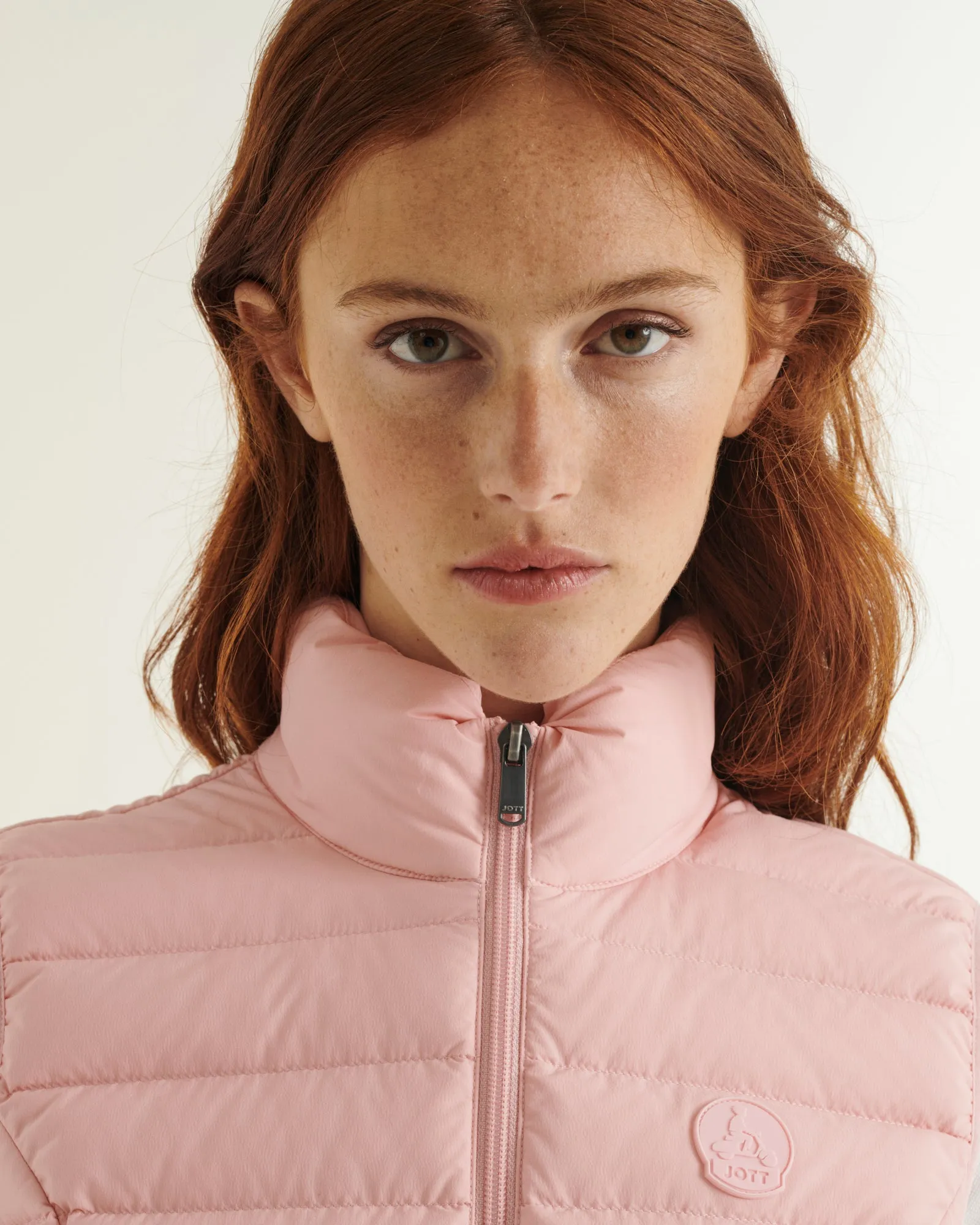 Peach pink Grenada stretch sleeveless puffer jacket